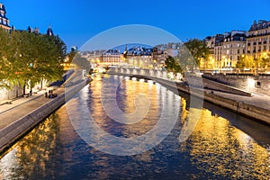 Paris at night - sunset over Seine river