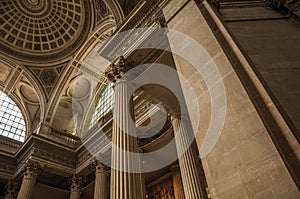 Pantheon inside view with high ceiling, columns, statues and paintings richly decorated in Paris.