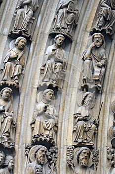 Paris, Notre-Dame cathedral, portal of the Virgin, the archivolts are populated by the Heavenly Court photo