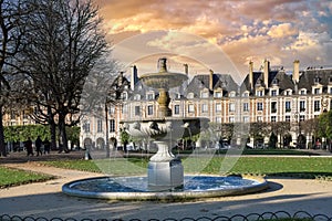 Paris, place des Vosges, an old fountain