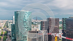 Paris skyline and Eiffel Tower timelapse from the top of the skyscrapers in Paris business district La Defense