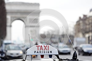 Paris taxi by the Arc de Triomphe