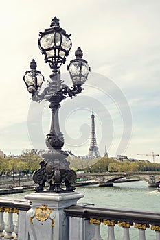 Paris view. Bridge of Alexandre III against the Eiffel Tower in Paris, France.