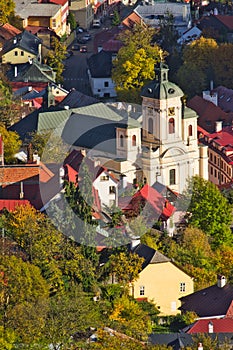 The parish church of the Assumption of Virgin Mary in Banska Stiavnica town during autumn