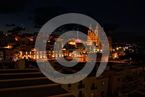 The Parish Church and other buildings lit up at night