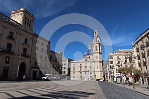 Parish of Santa Maria in the Plaza de EspaÃÂ±a with Town Hall to the left. Alcoy, Alicante, Spain photo