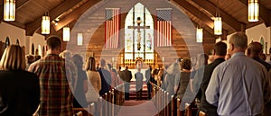 Parishioners stand respectfully in a church adorned with an American flag, engaged in a service that blends faith with