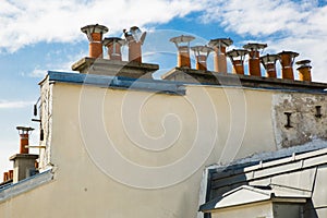 Parisian Clay Chimney Pots, Blue Sky, Clouds photo