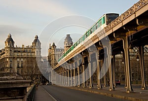 Parisian metro train on the Bir-Hakeim bridge over