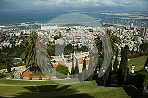 View from the top on the Bahai Gardens and Haifa City photo