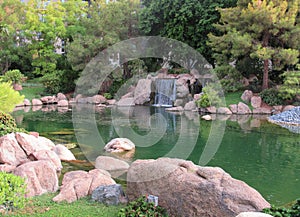 Park in Arizona with a Koi pond with a waterfall