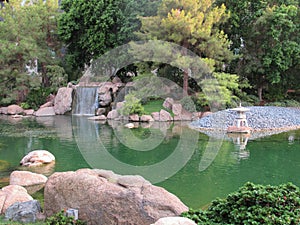 Park in Arizona with a Koi pond with a waterfall