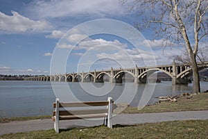 Park bench at the river's edge