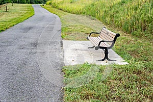 Park Bench by a Walking Path