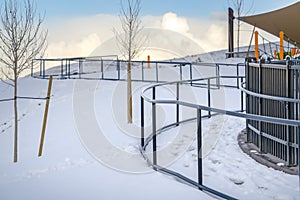 Park in Eagle Mountain Utah against blue sky with clouds in winter