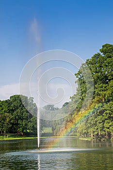 Park fountain with rainbow