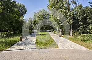 The park has walking paths with benches.