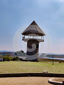 Park located near the meadow under blue sky