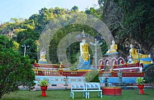 Park with lots of Buddha statues near sacred Kaw Ka Thawng Cave