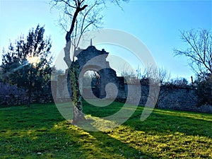 Park of the Monsters, Sacred Grove, Garden of Bomarzo. High wall encircles the entire garden and light, alchemy