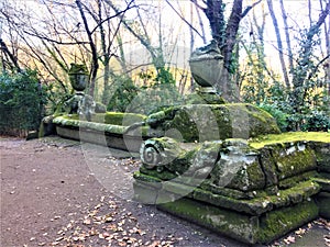 Park of the Monsters, Sacred Grove, Garden of Bomarzo. A now-dry pool with dolphin fountain heads at both ends, alchemy
