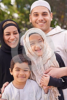 Park, muslim family and portrait of parents with children for bonding, ramadan and outdoors together. Islam, happy