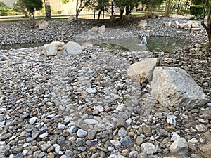 Park on palm island, fountain in skanzen