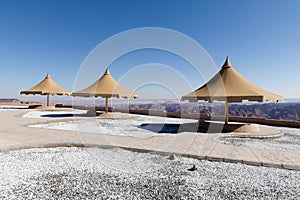 Park with a parasol near Al Ula. From the lookout point you have a beautiful view down into the valley, Saudi Arabia