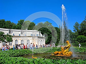 Park of Peterhof, Russia, fountain the Triton, people