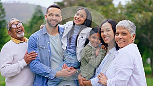 Park portrait of grandparents, happy kids and parents, smile and bonding adventure in nature. Hug, fun or memory for big