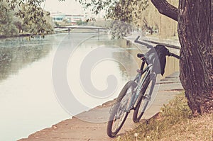 Park with river and bicycle track/bicycle track in park near the river