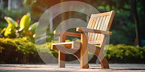 Park in the summer with wooden chair, tree and green grass blurred background