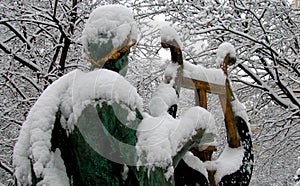 A park under snow of a man playing a harp - WINTER - RUSSIA