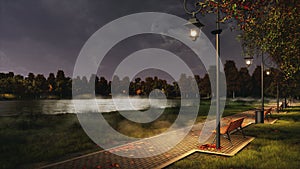 Park walkway lit by street lamps at autumn night