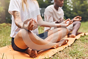 Park yoga meditation, zen and mudra hands gesture in lotus pose for nature exercise and workout. Calm energy, healthy