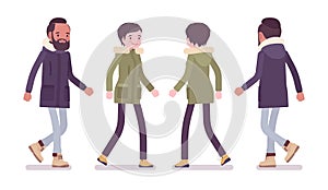 Parka man and woman walking