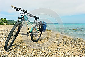 Parked on the beach mountain bike waiting for the continuation