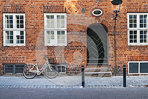 Parked Bicycle near house in Copenhagen, Denmark