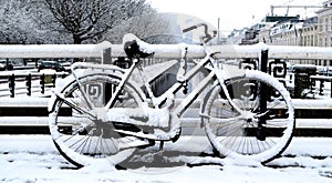 Parked bicycle on a winter day in the city