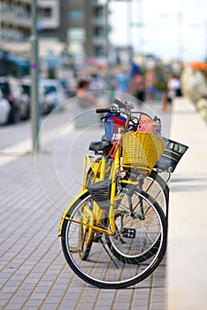 parked bicycles on the promenade of Rethimnon in Crete photo