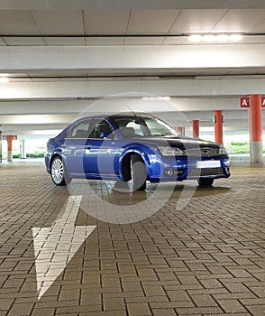 Parked blue sports car