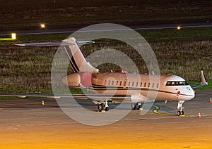 Parked business Jet with engines covered up