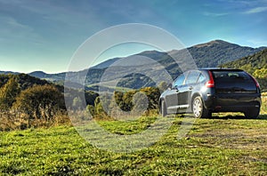 Parked car on the meadow