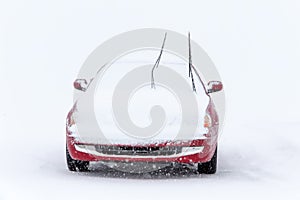 Parked Car in Winter Snowstorm