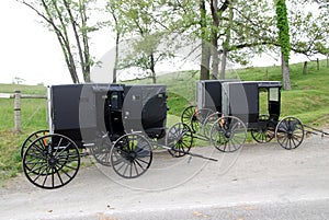 parked carriages of amish people