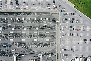 Parked cars near city shopping mall. outdoor parking lot. aerial view
