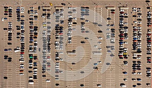 Parked cars in the Parking lot near the shopping center. Aerial view