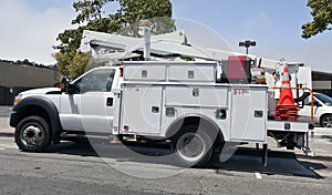 Parked communications  truck with cherry picker