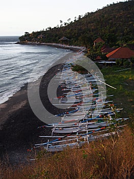 Parked Fishing Boats on the Beach, Amed, Bali photo