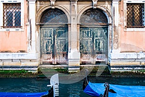 The parked gondolas in small back channel